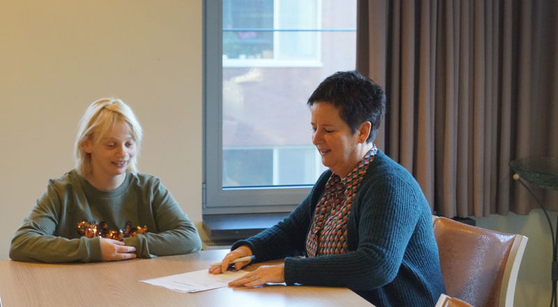 Met begeleiding voor een werkgever
